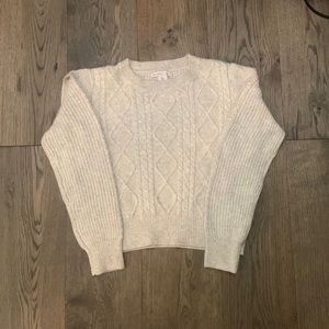Cream sweater, barley worn